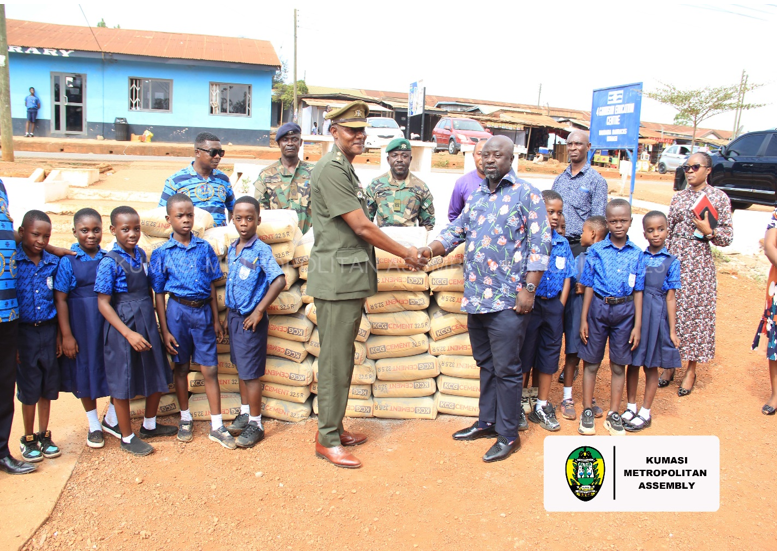 KMA BOSS DONATES TO ALMA MATER,4 GARRISON BASIC SCHOOL